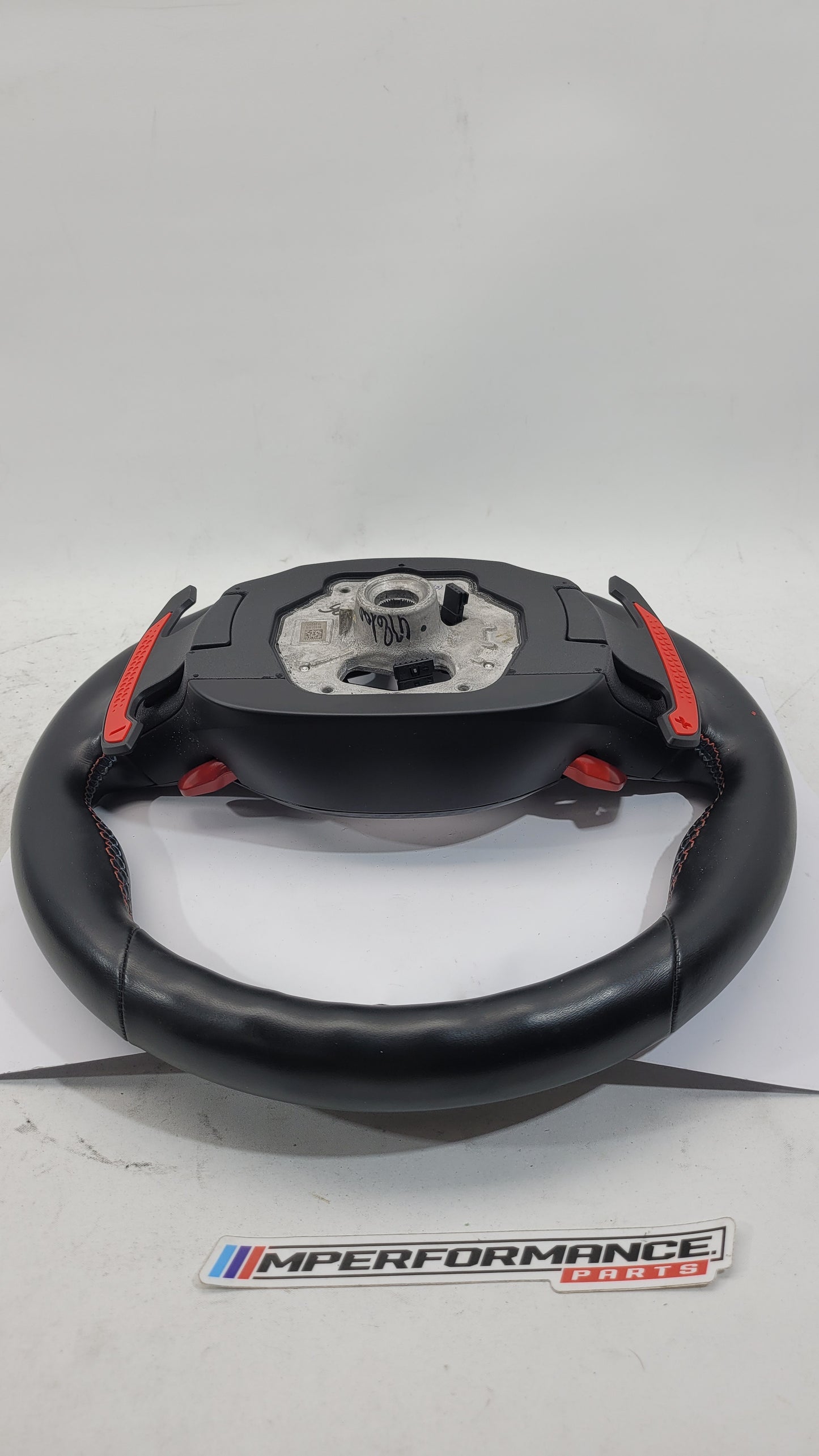 BMW M2 M3 M4 G80 G82 leather M steering wheel with black and silver accents, sporty design, and MPerformance.parts branding