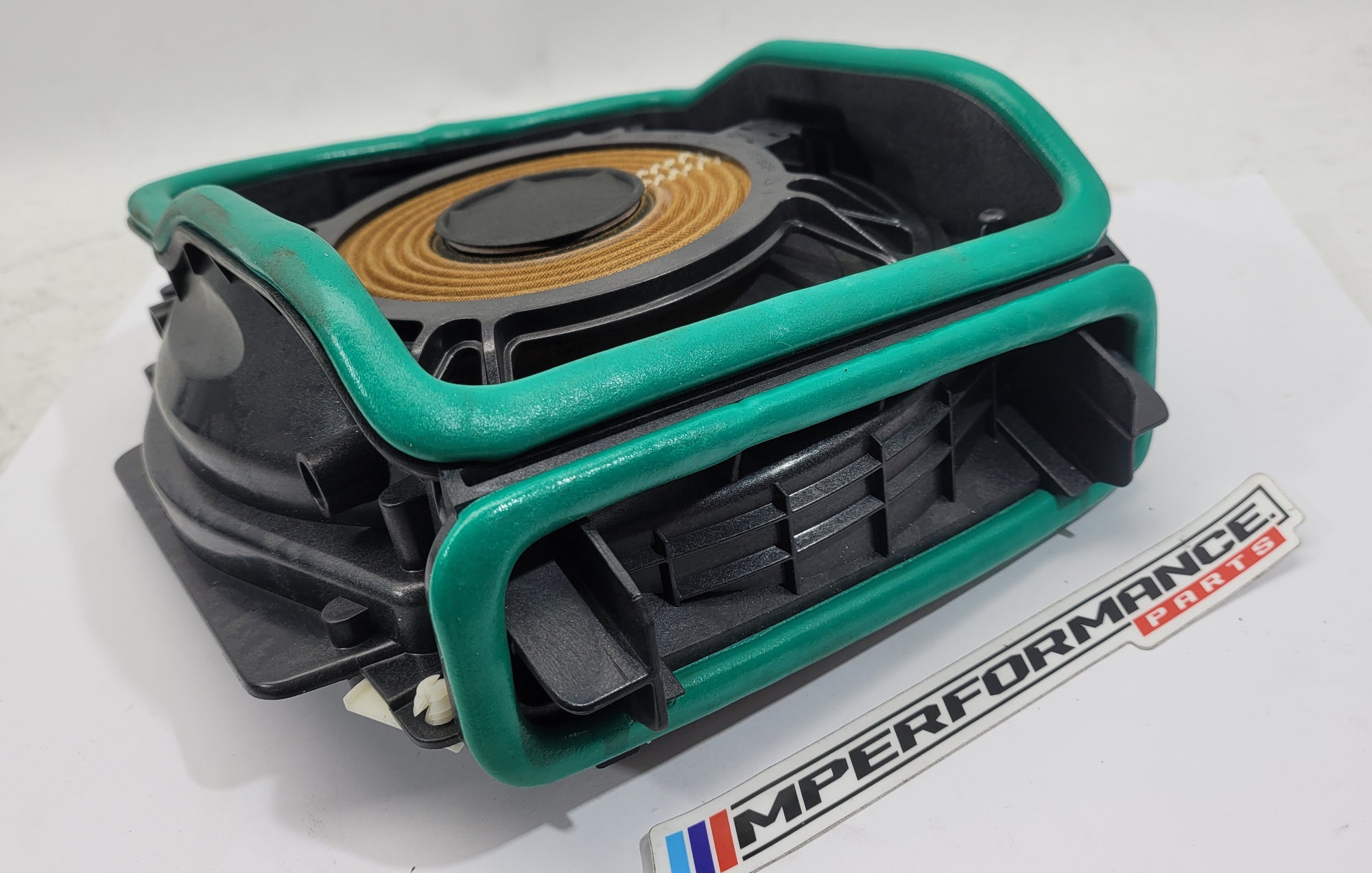 BMW G8x M3 M4 M2 Harman Kardon right subwoofer bass speaker, OEM car audio component with branding and wiring visible.