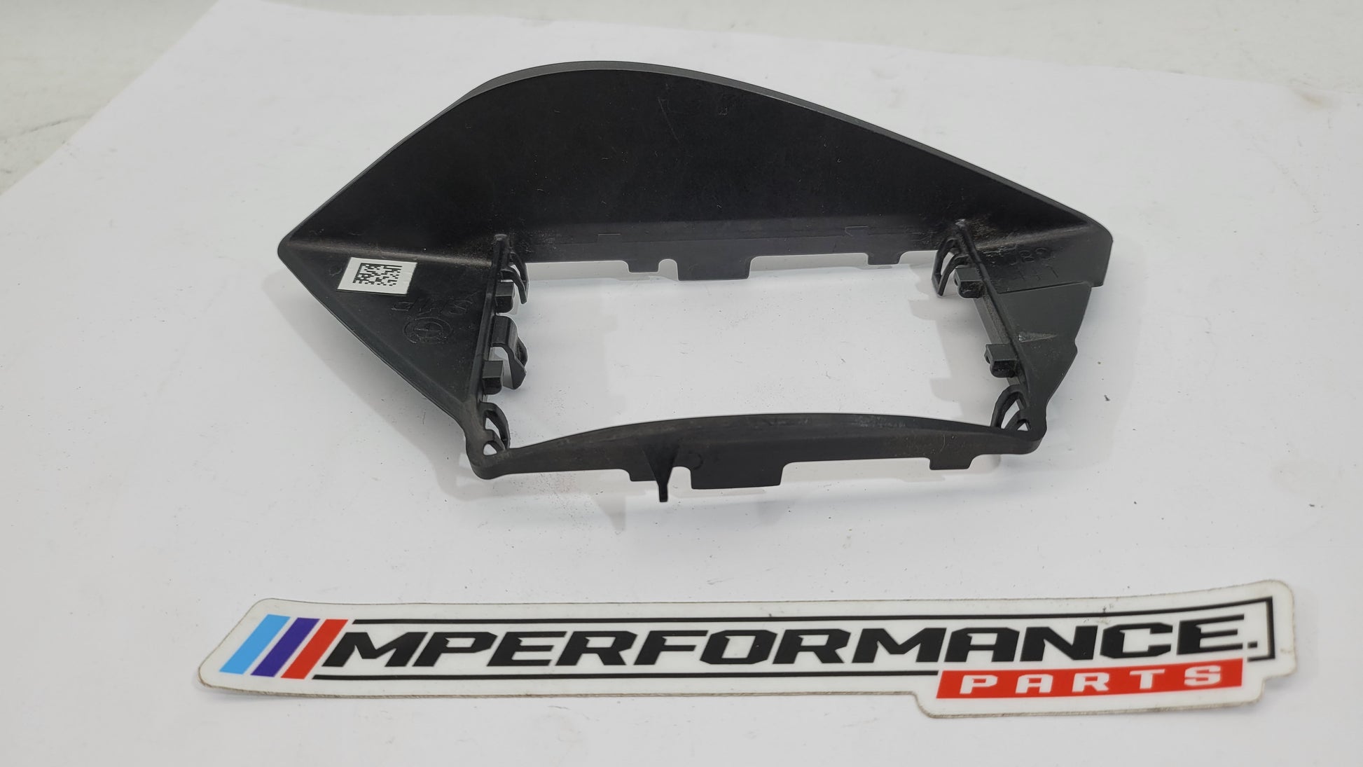 BMW G80 M3 Competition blind spot sensor bracket by MPerformance.parts, showing the metal bracket with mounting features.