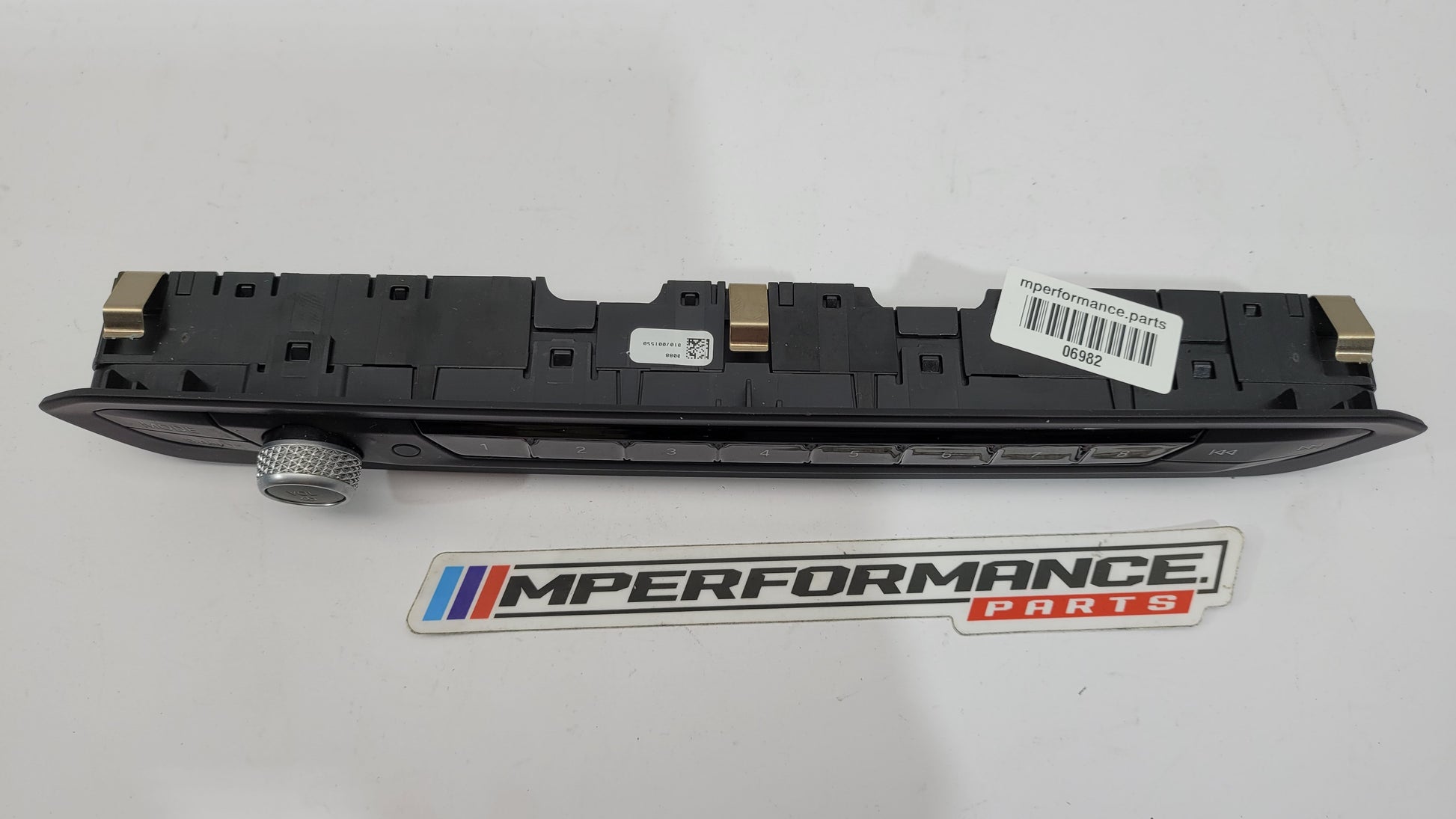 BMW G22 G80 M3 Competition radio control trim in black with silver accents, designed for MPerformance.parts vehicle interior upgrade.