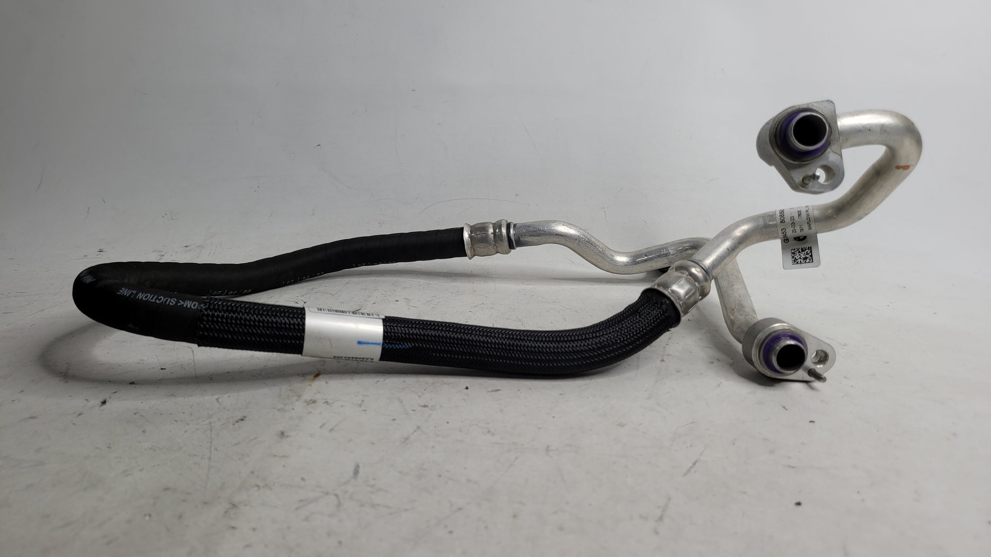 BMW 3 Series G80 M3 air conditioning pipe hose, genuine MPerformance.parts, showing the metal and rubber connector components.