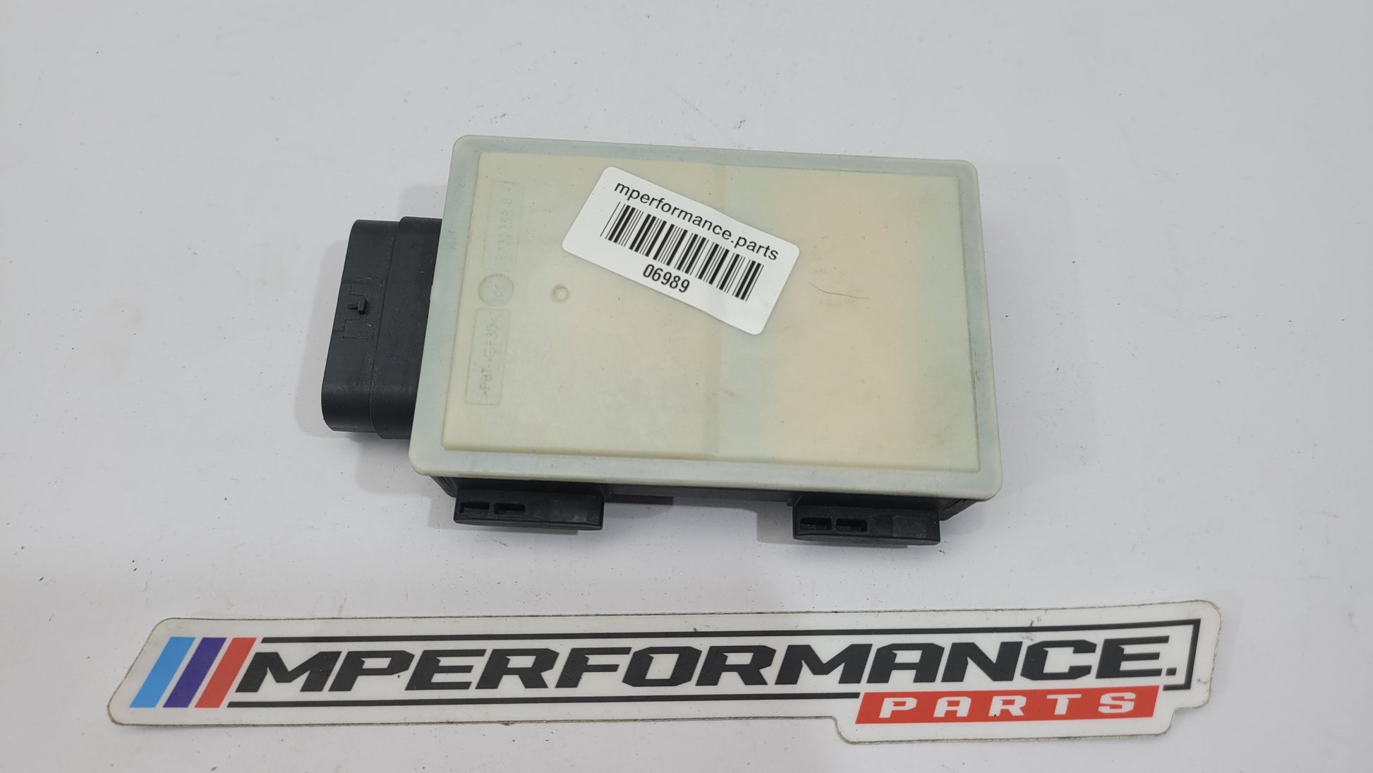 BMW G05 X5, X4, X3 G30, G20, G80 M3 front radar sensor by MPerformance.parts, showing close-up of the sensor component.