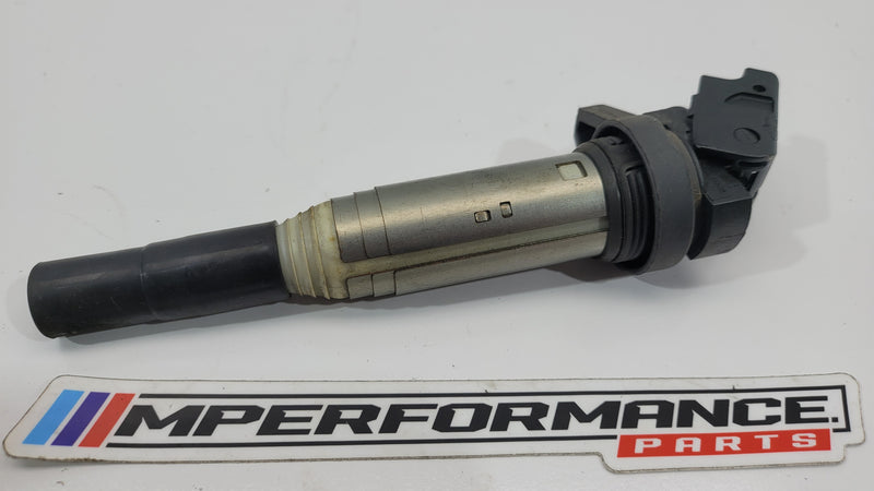 BMW F3x F8x petrol ignition coil by MPerformance.parts, showing the black coil with electrical connectors and mounting features.