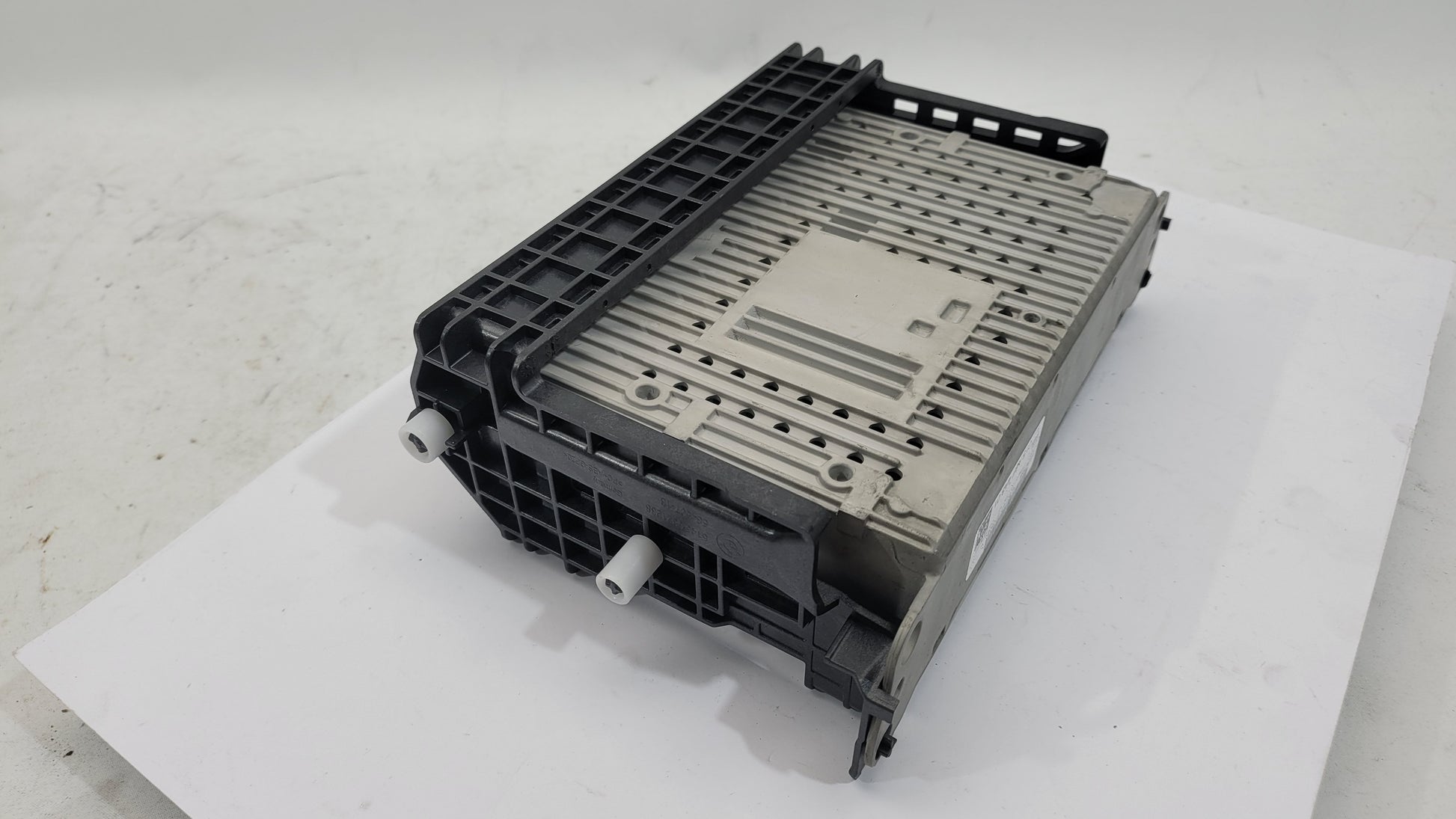 BMW G01 G20 G30 G32 G05 G16 G26 G8X G8X navigation AM FM radio head unit by MPerformance.parts, showing front display and controls.
