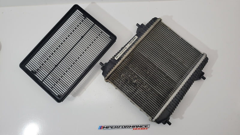 BMW G80 G82 G83 M3 M4 21-24 front auxiliary radiator coolant cooler, MPerformance.parts, showing the aluminum cooling component.