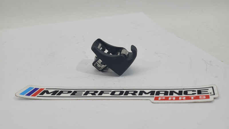 BMW sun visor screen clip 7277251 by MPerformance.parts, showing the small black plastic clip on a plain background.