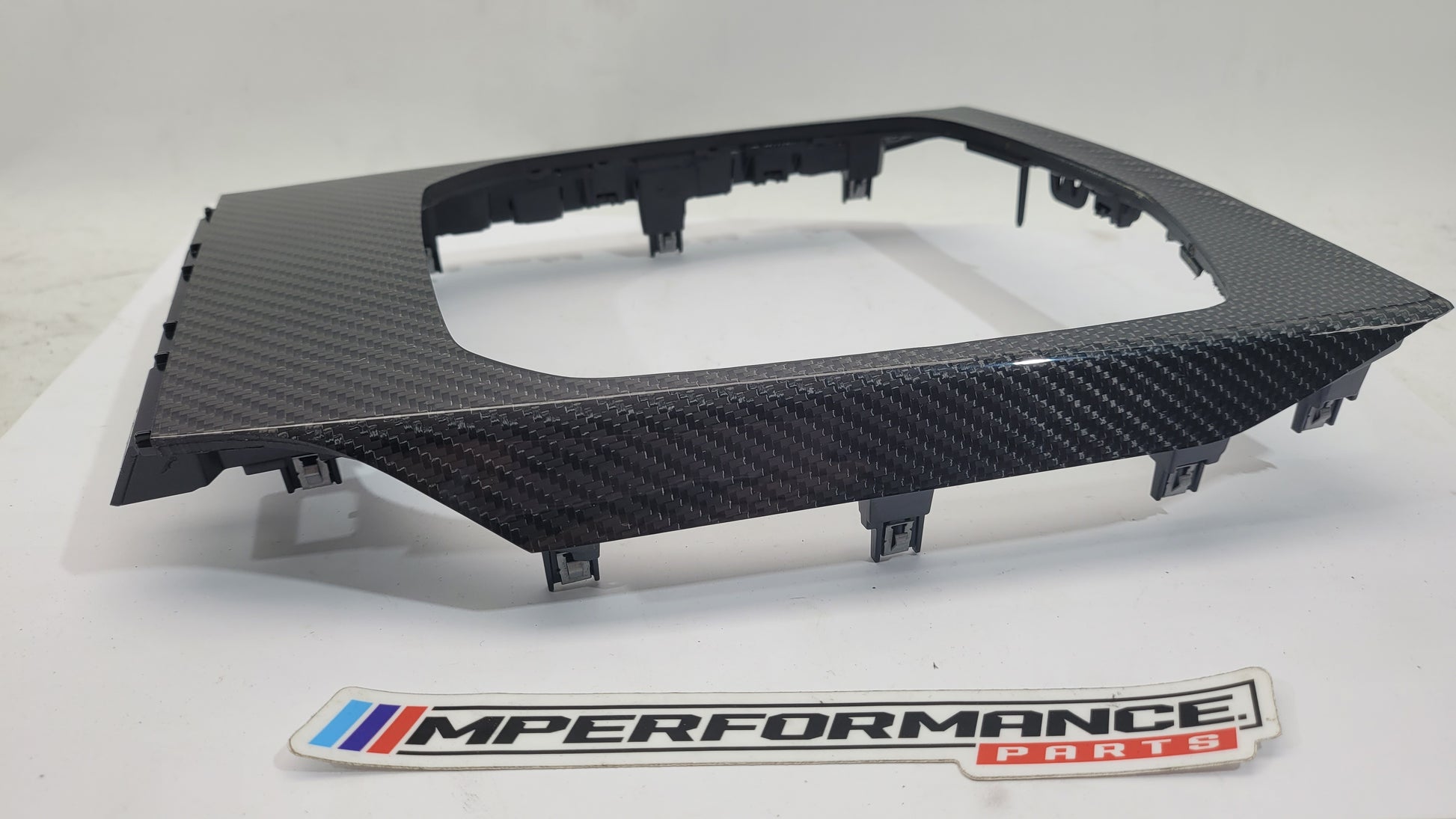 BMW M3 G80 interior carbon trim by MPerformance.parts, showing sleek black carbon fiber accents inside the vehicle.