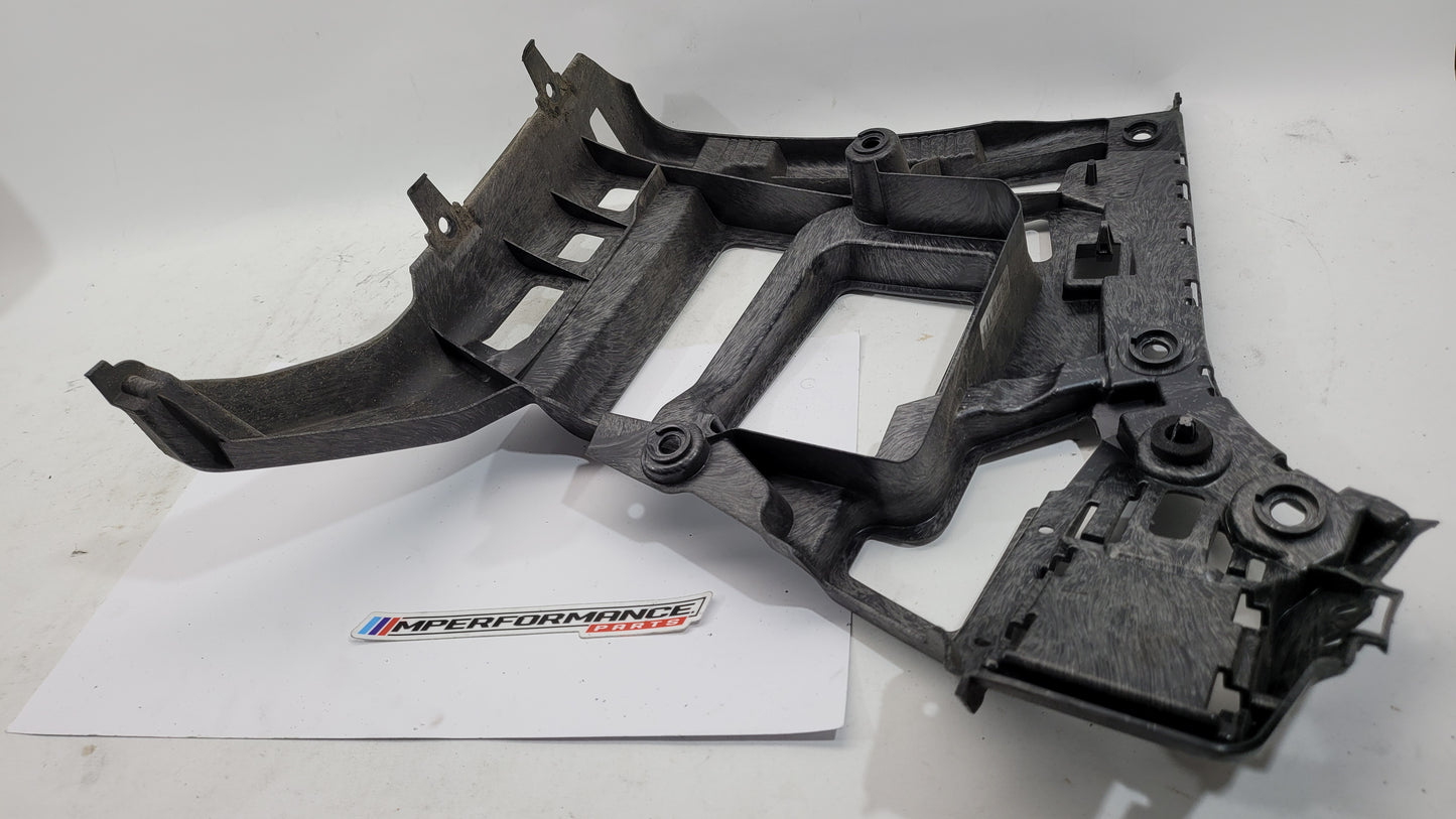 BMW M3 xDrive G80 rear bumper support bracket by MPerformance.parts, showing the metal bracket with mounting holes and structural design.