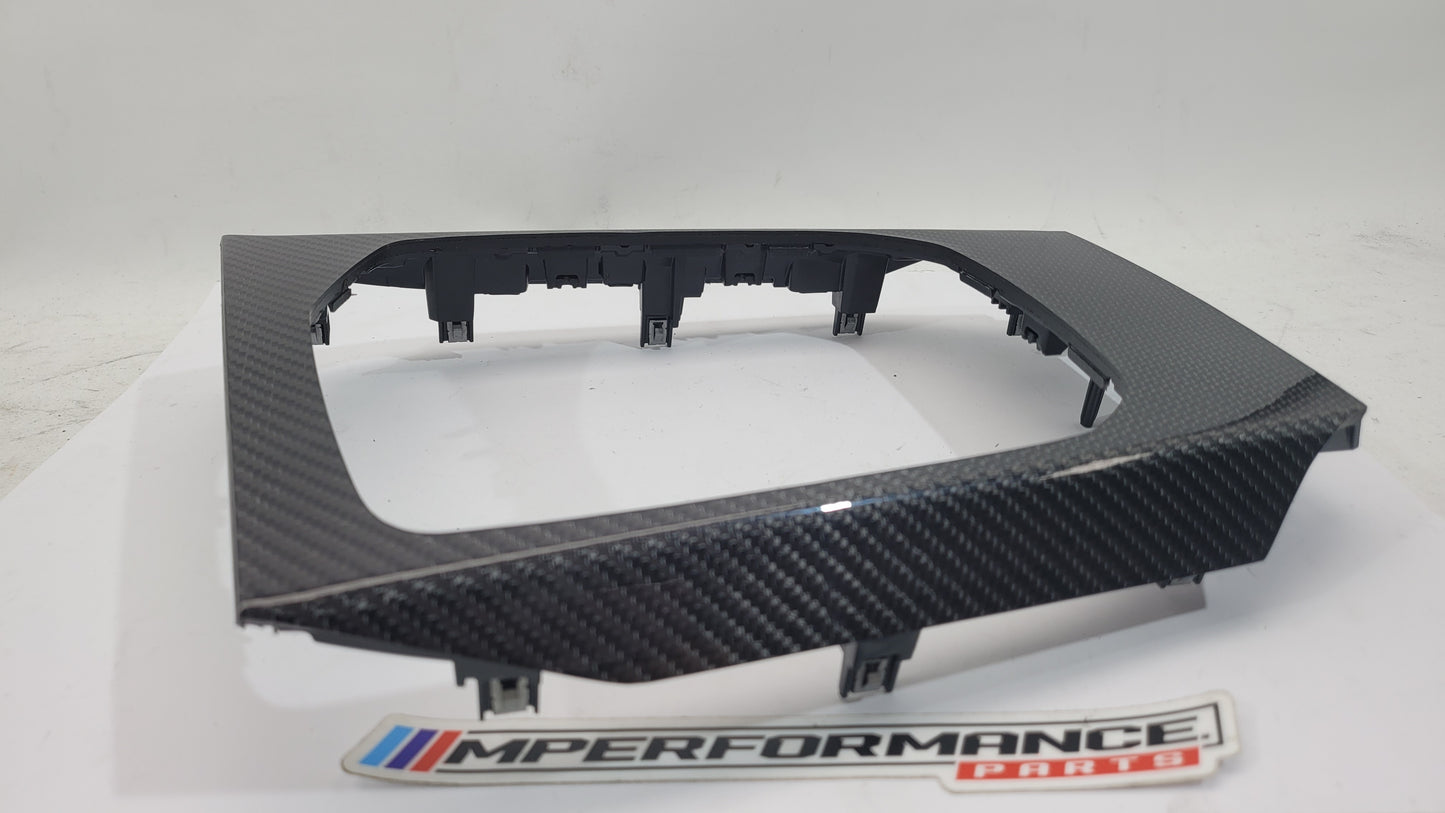 BMW M3 G80 interior carbon trim by MPerformance.parts, showcasing sleek black carbon fiber accents inside the vehicle.