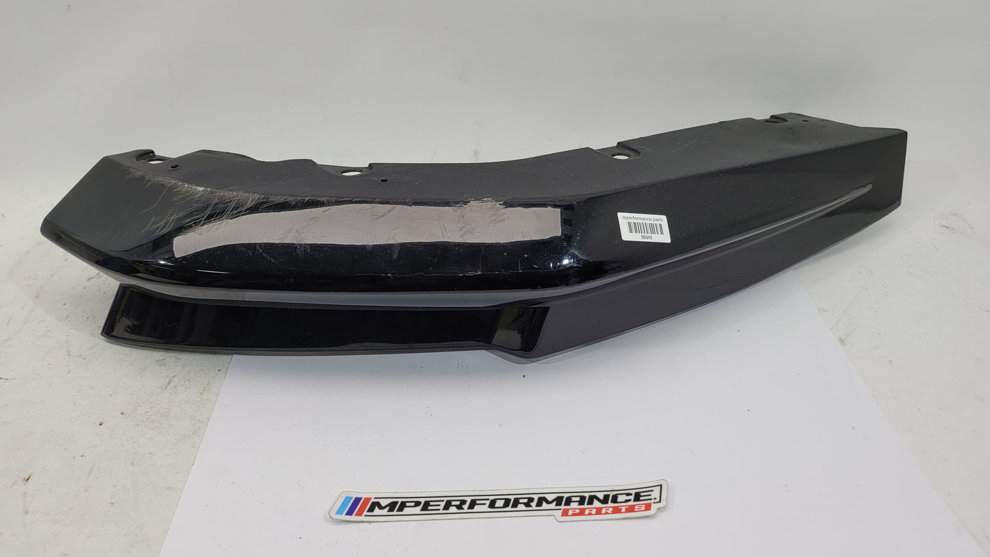 BMW G80 M3 rear bumper left corner spat splitter, black aerodynamic component with textured finish, designed for sporty styling.