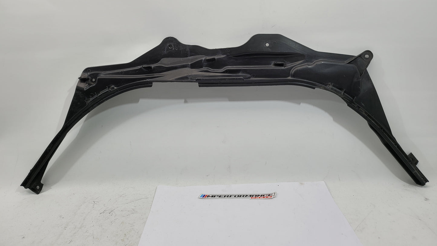 BMW M3 G8X firewall upper section cover panel by MPerformance.parts, showing the black protective metal cover with mounting points