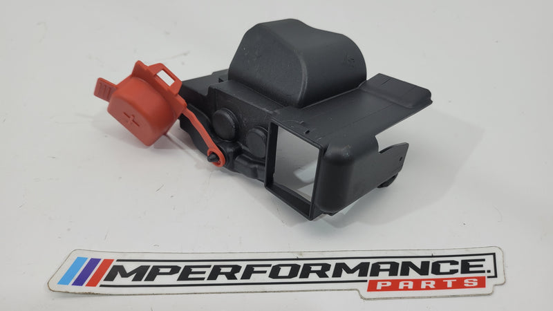 BMW M3 G80 positive battery clamp cover in black with MPerformance.parts branding, designed for secure battery connection.