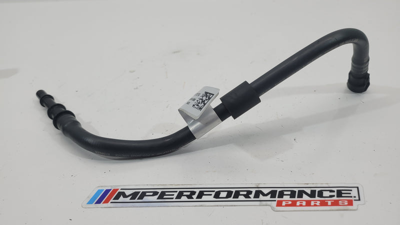 BMW G87 M2, G80 M3, G82 M4 fuel tank pipes by MPerformance.parts, showing metal fuel line components with connectors.
