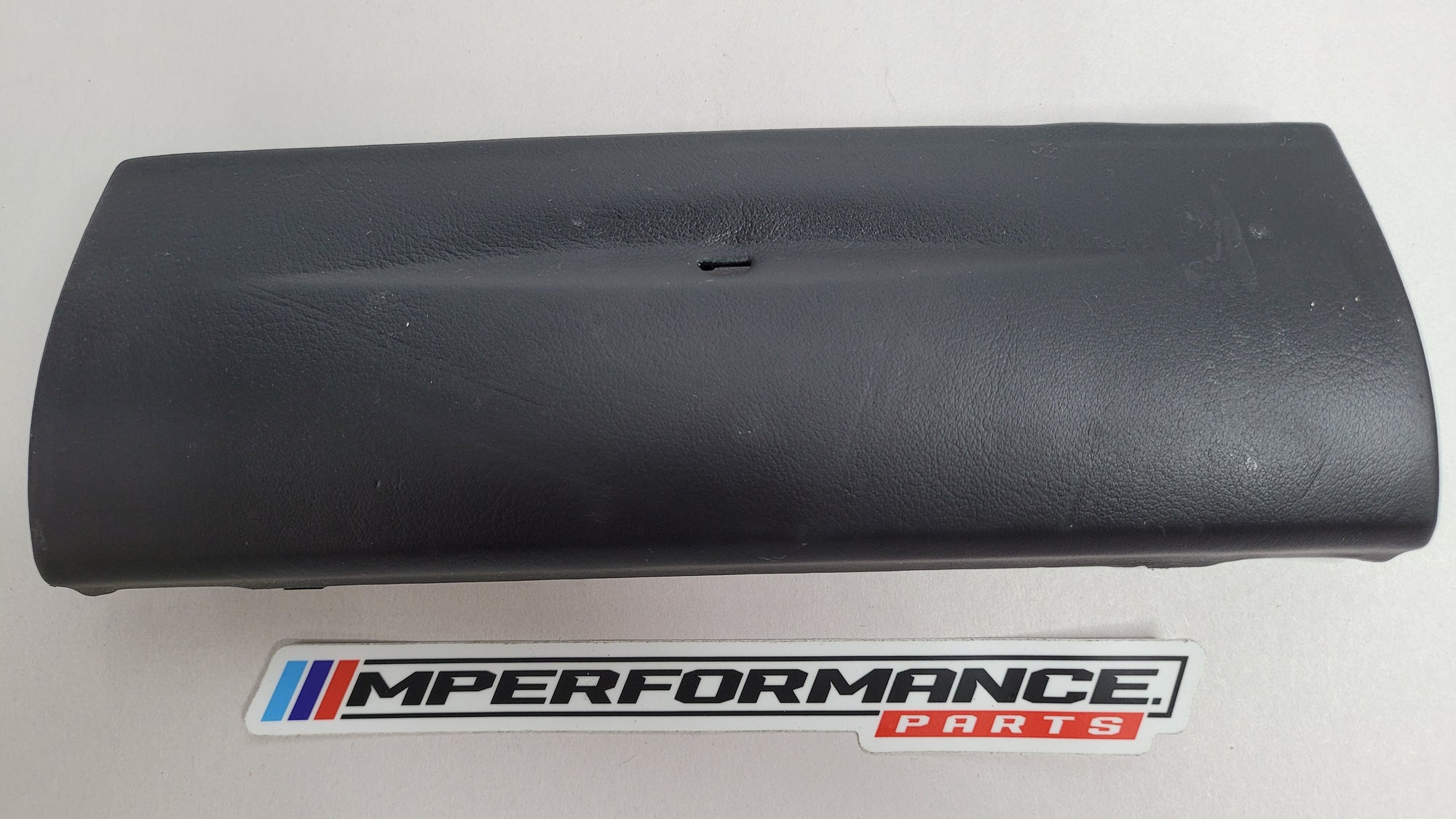 BMW MPerformance.parts leather center stack bottom trim for 51458062561 model, showing the textured black leather finish.