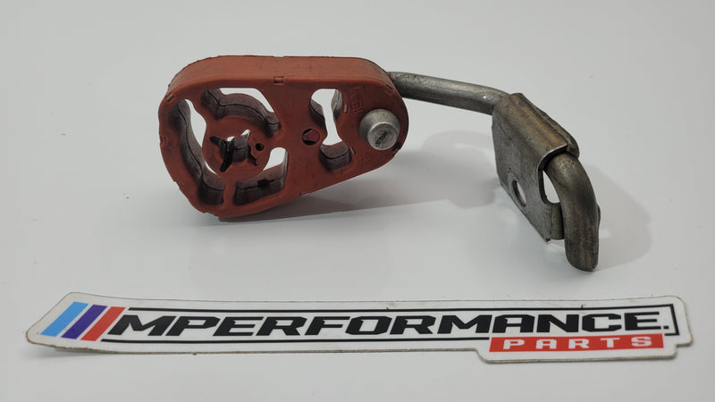 BMW M3 G80 exhaust muffler insulator bracket, part number 7583940, showing the metal mounting bracket with rubber insulation.