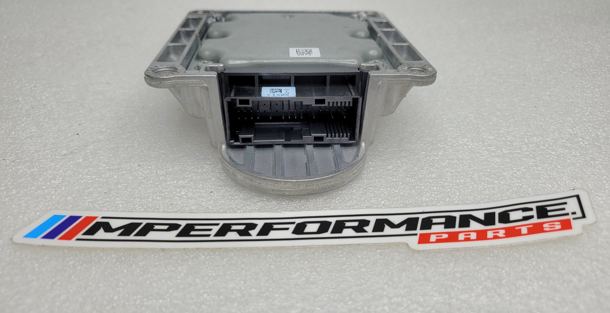 BMW 1 2 3 4 Series F20 F22 F30 F32 F80 F82 airbag module control unit from MPerformance.parts, showing the electronic control device.