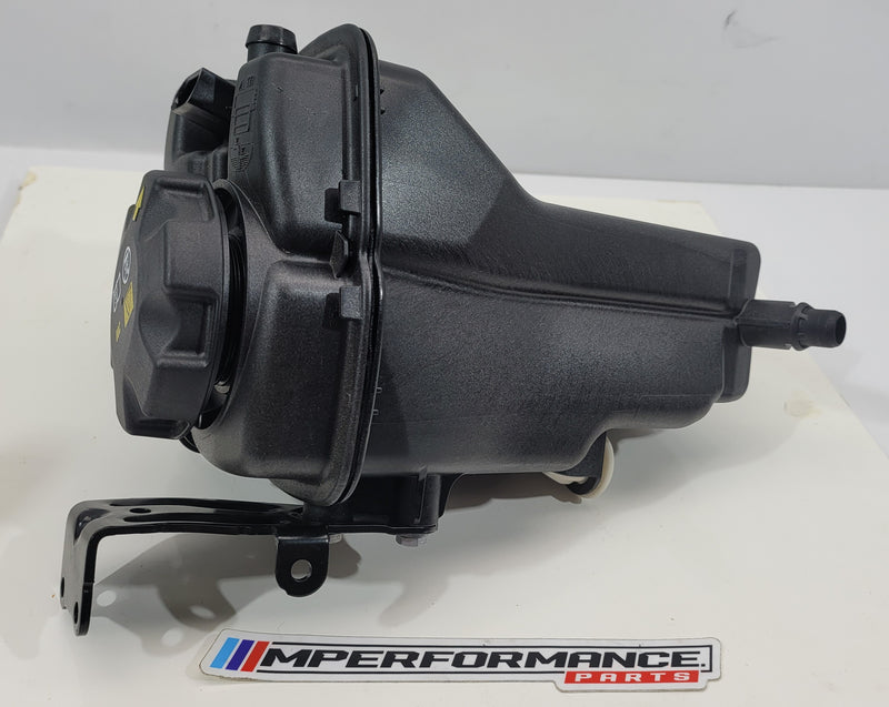 BMW M3 M4 G80 G82 G83 expansion tank overflow bottle from MPerformance.parts, showing the black plastic tank with mounting points.