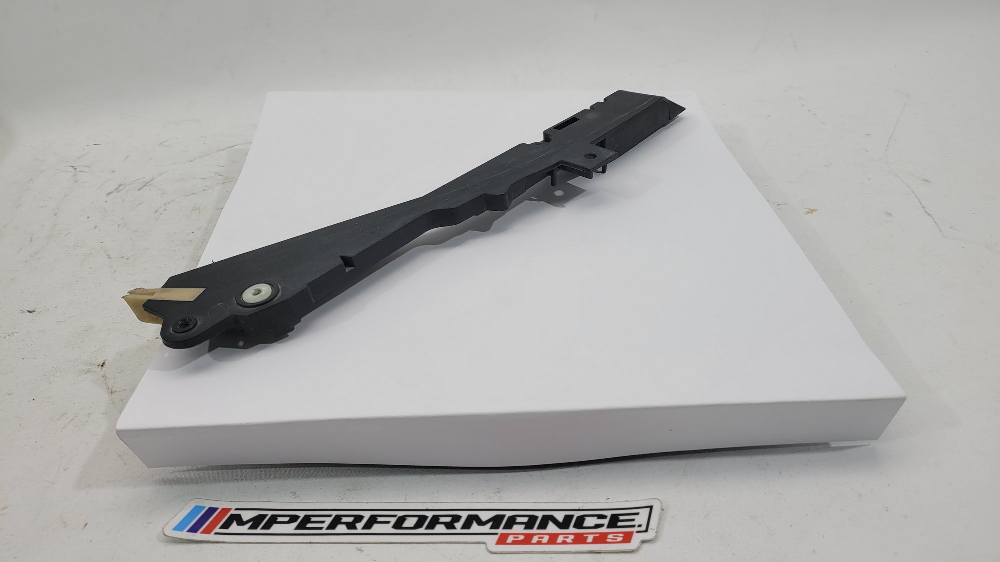 BMW M3 G80 front right trim panel cover by MPerformance.parts, showing the sleek black interior trim with textured finish.
