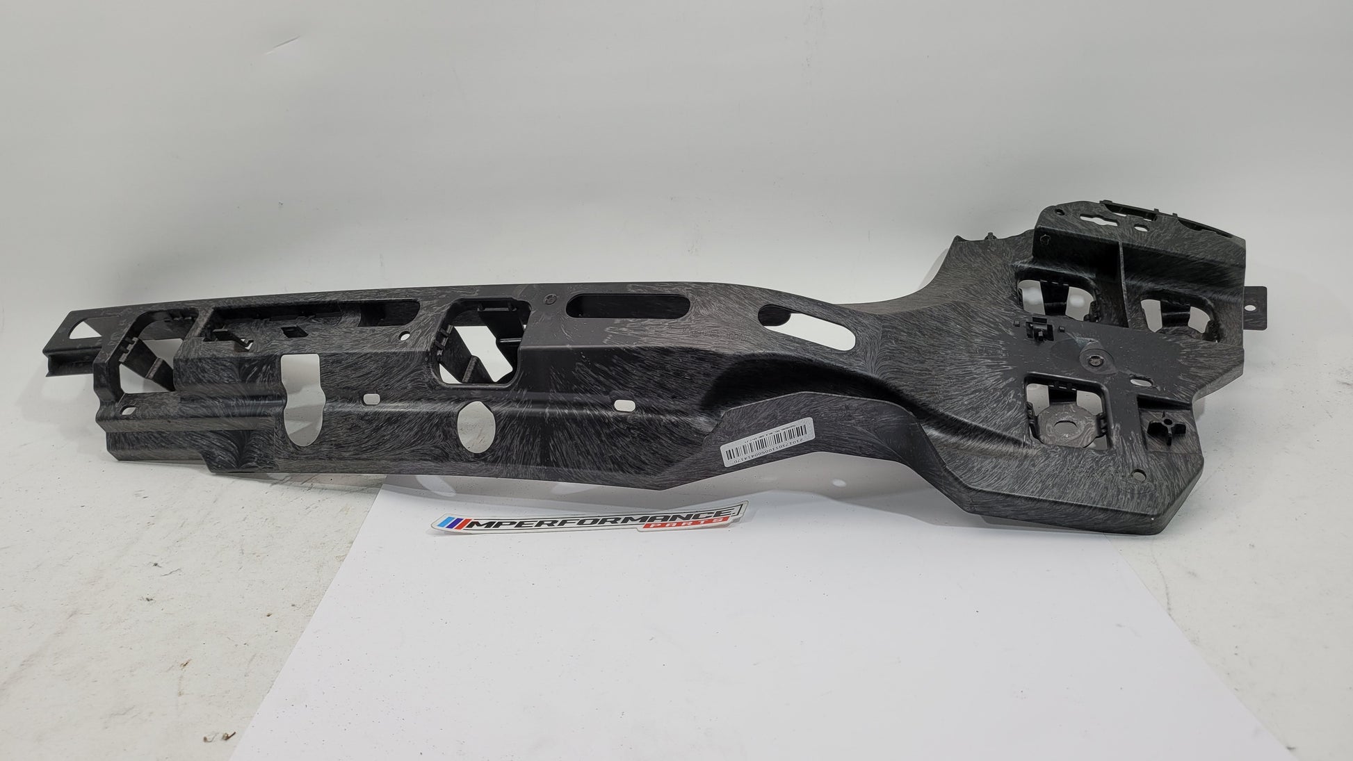 BMW M3 G80 rear bumper right bracket, part 8074698, showing the metal mounting bracket for the rear bumper assembly.