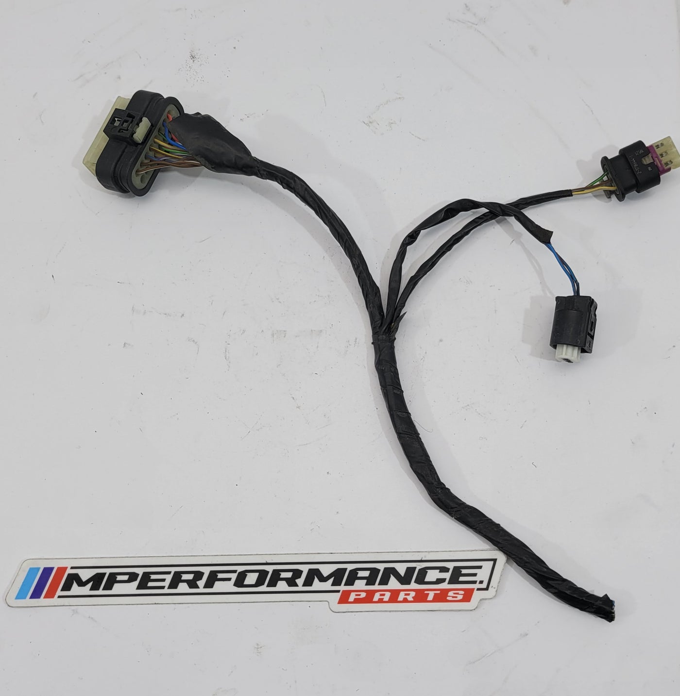 BMW Parking Loom PDC Connector 1718555 by MPerformance.parts, showing a close-up of the black connector with wiring.