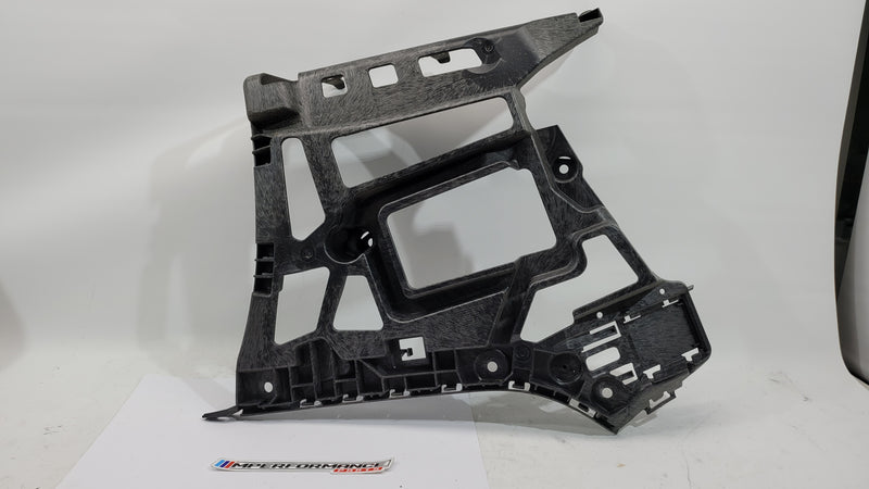BMW M3 xDrive G80 rear bumper support bracket in black metal with mounting points and structural design, part number 8069446.