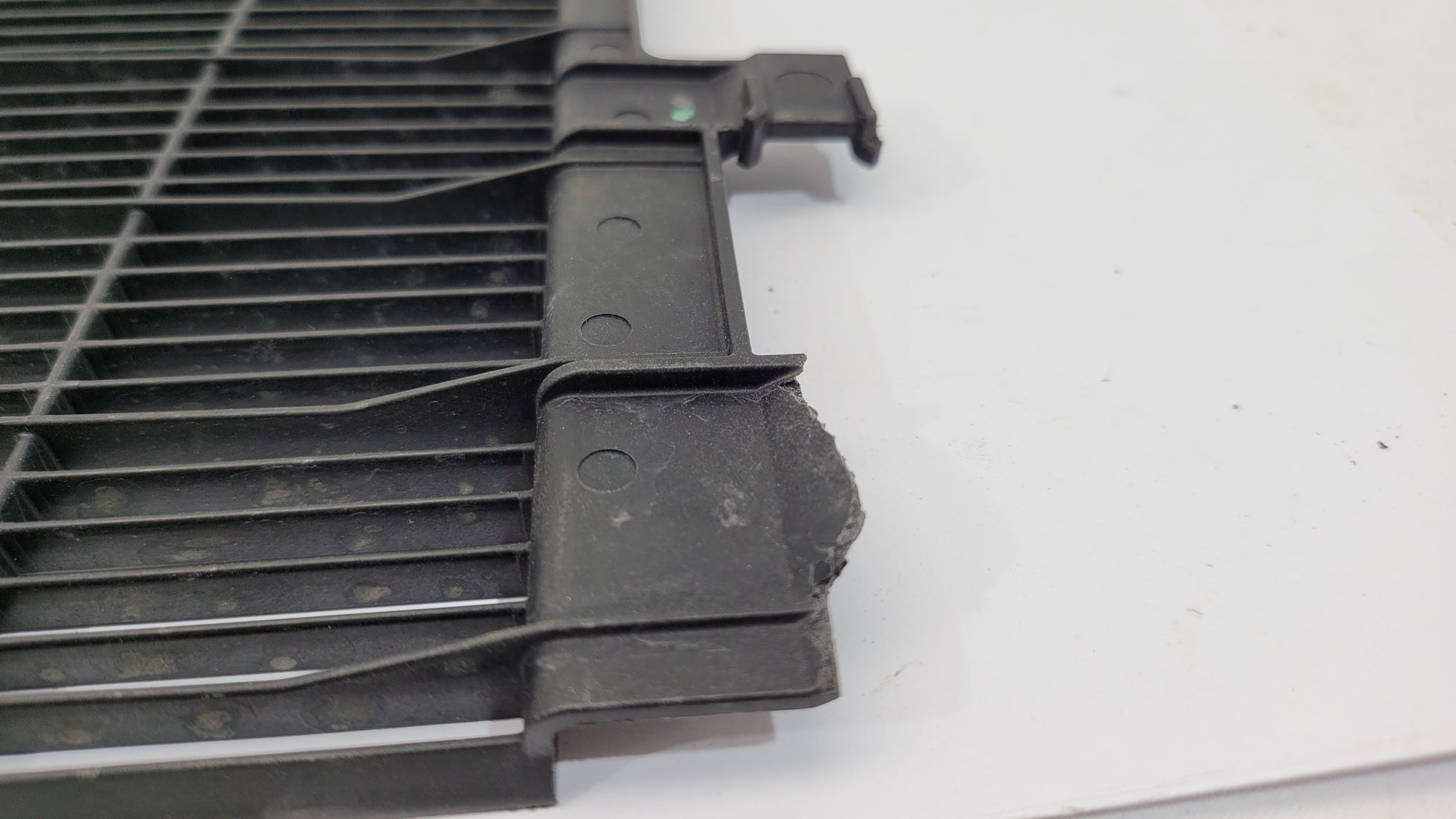 BMW G80 G82 G83 M3 M4 Competition plastic radiator cover shroud by MPerformance.parts, shown in black with mounting details.