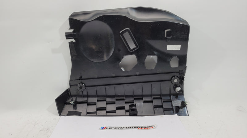 BMW 1 Series F20 F21 F23 front left lower dash cover panel trim in black with MPerformance.parts branding visible.