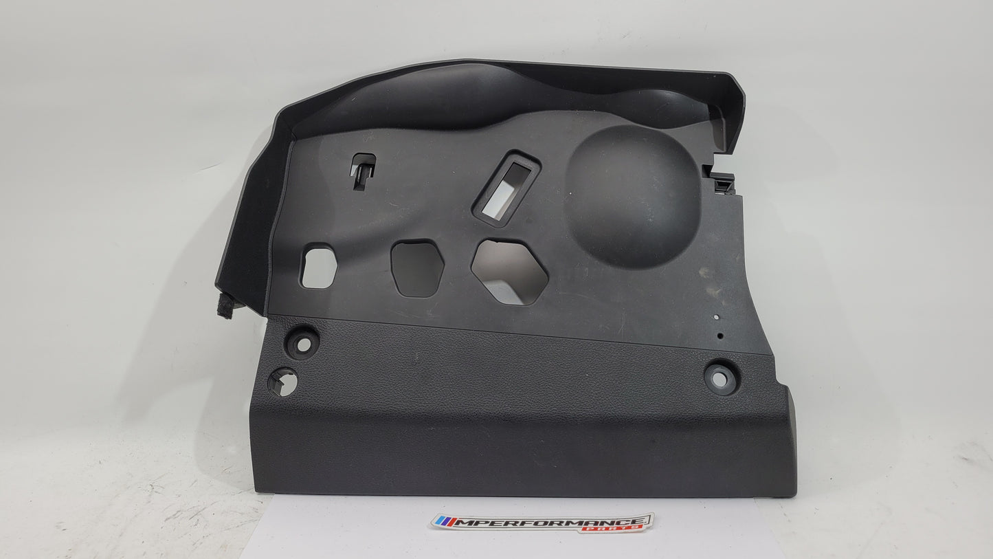 BMW 1 Series F20 F21 F23 front left lower dash cover panel trim by MPerformance.parts, showing the black plastic trim piece.