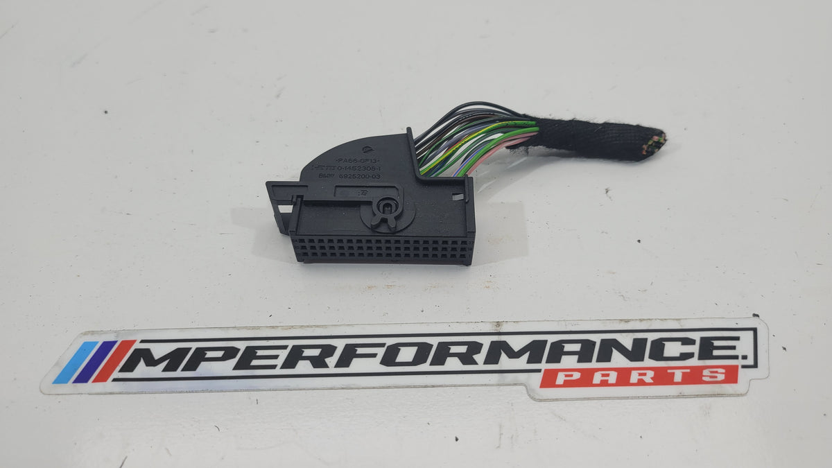 MPerformance.parts flag plug with blue, red, and white colors, featuring the MPerformance logo on a sleek, durable plastic surface.