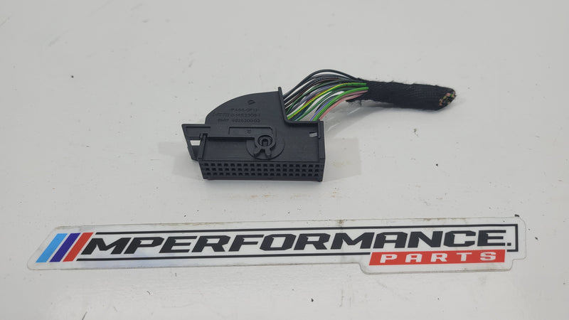 MPerformance.parts flag plug with blue, red, and white colors, featuring the MPerformance logo on a sleek, durable plastic surface.