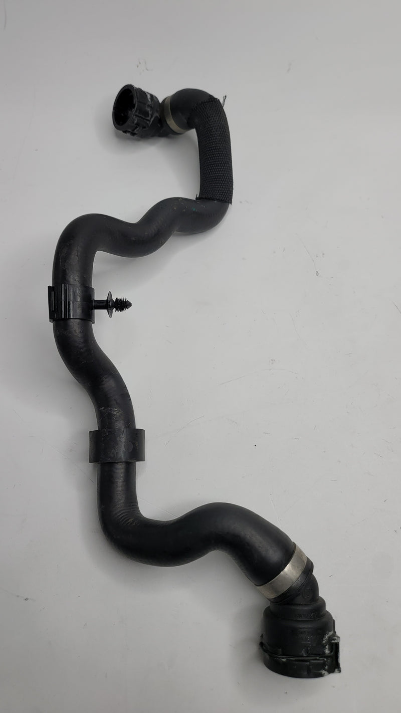 BMW G80 G82 M3 M4 radiator water pump coolant hose pipe by MPerformance.parts, showing the durable flexible hose with fittings.