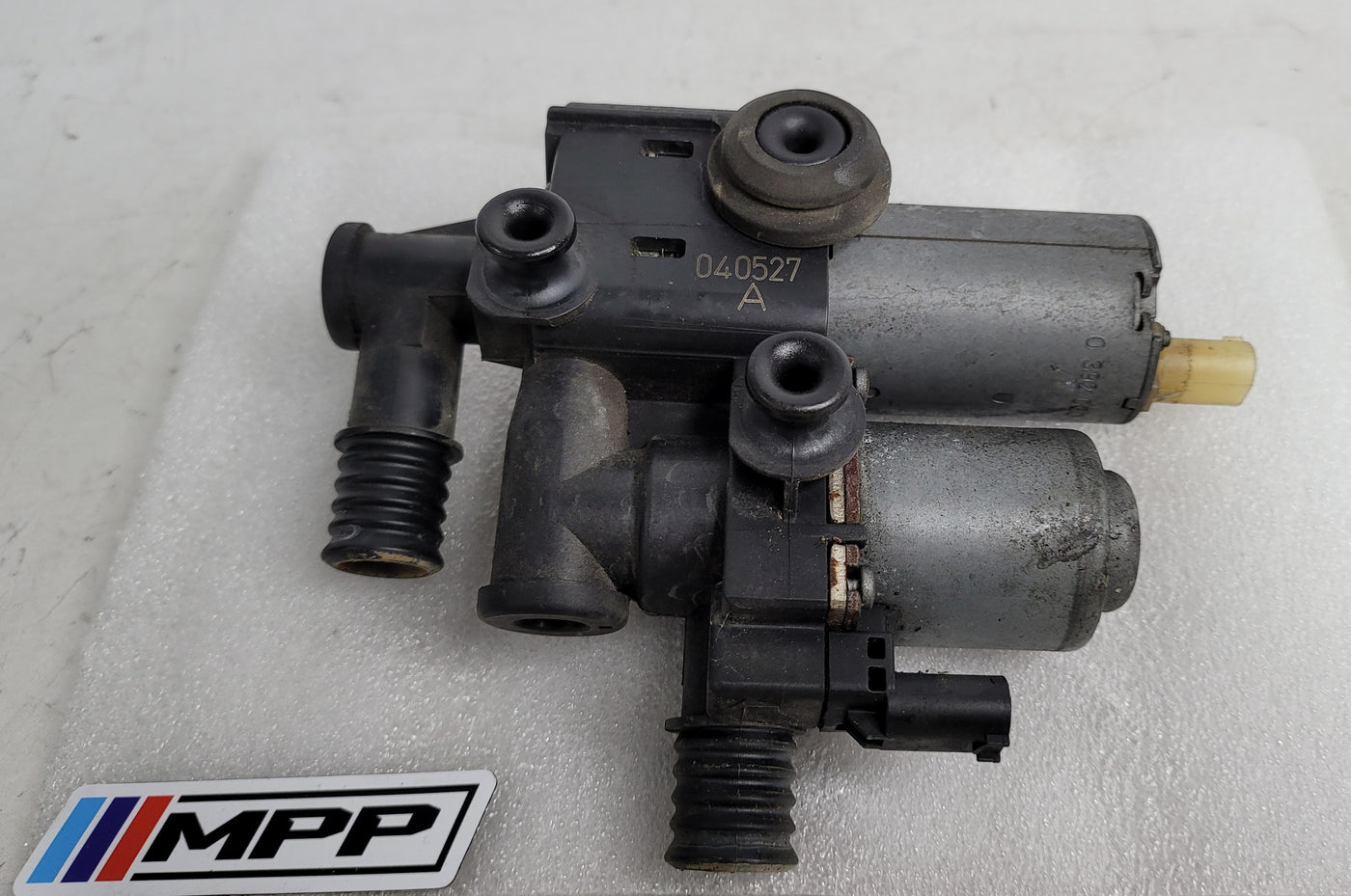 BMW 3 Series water valve with pump for M3 E46 (2003-2008), part number 8369807, showing the metal valve and attached pump.