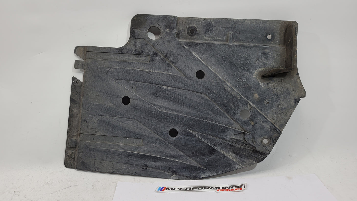 BMW M3 M4 series rear left underbody panel by MPerformance.parts, showing the black undercarriage component for F80, F82, and F83 models.