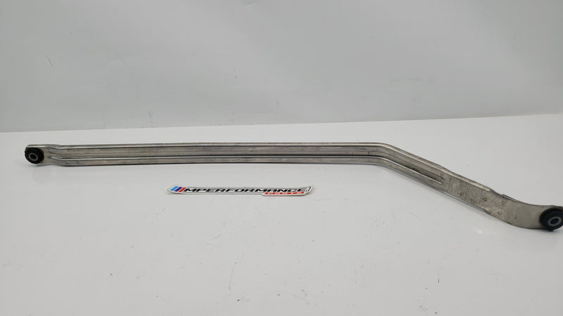 BMW G80 M3 fuel tank mounting tension strap by MPerformance.parts, showing the black metal strap with mounting brackets.