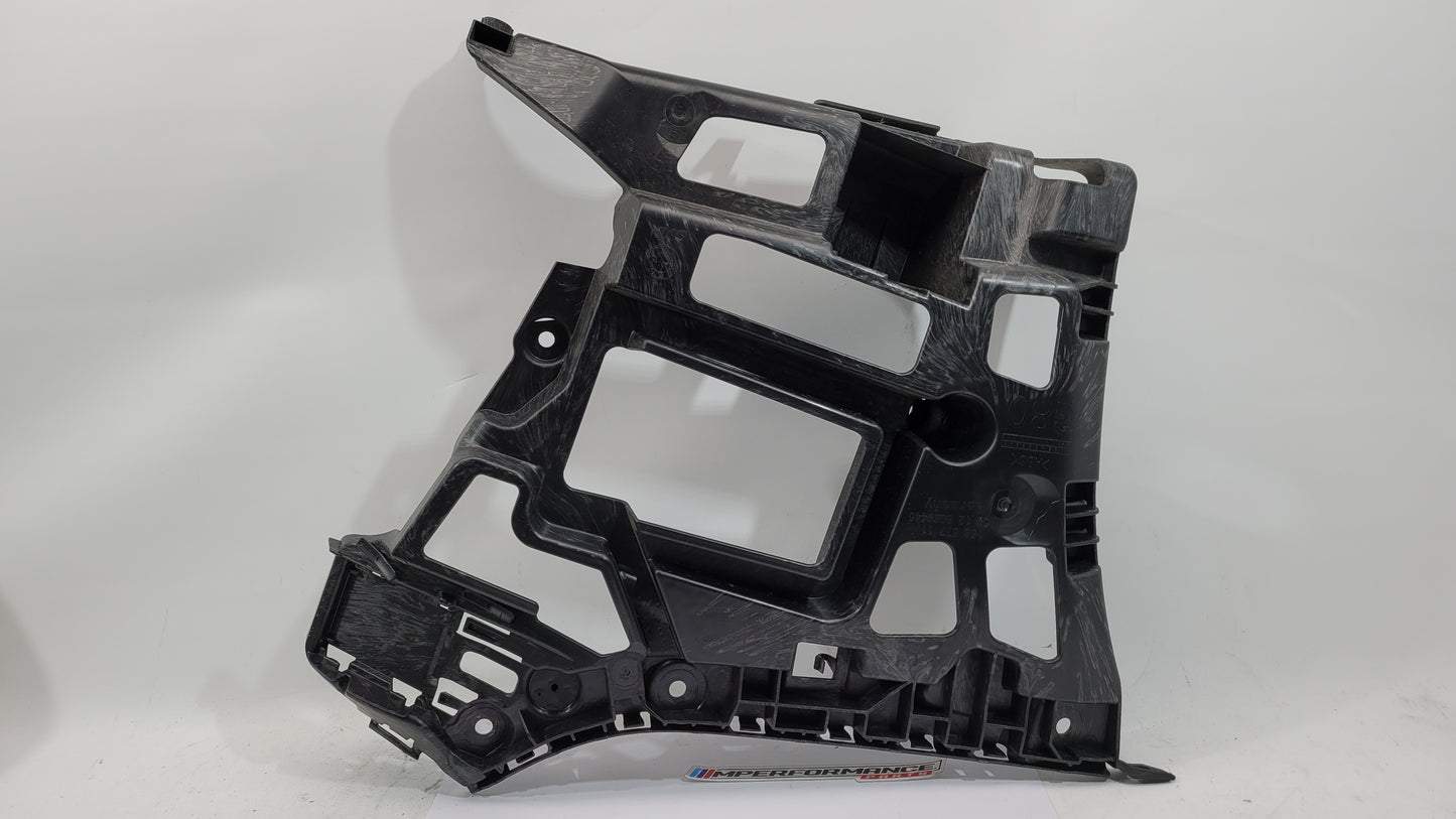 BMW M3 M4 G80 G82 rear left bumper corner bracket, MPerformance.parts replacement part, close-up view showing mounting details