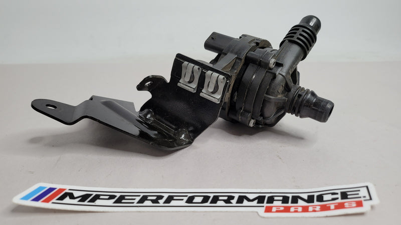 BMW 3 Series G20 auxiliary water coolant pump by MPerformance.parts, showing the metal pump with inlet and outlet ports.