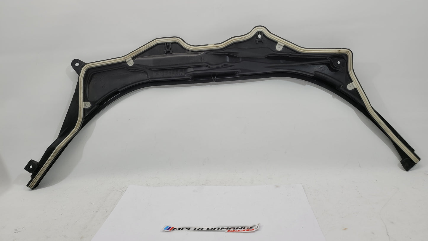 BMW M3 Series G8x upper firewall cover panel in black with MPerformance.parts branding, showing its textured metal surface.