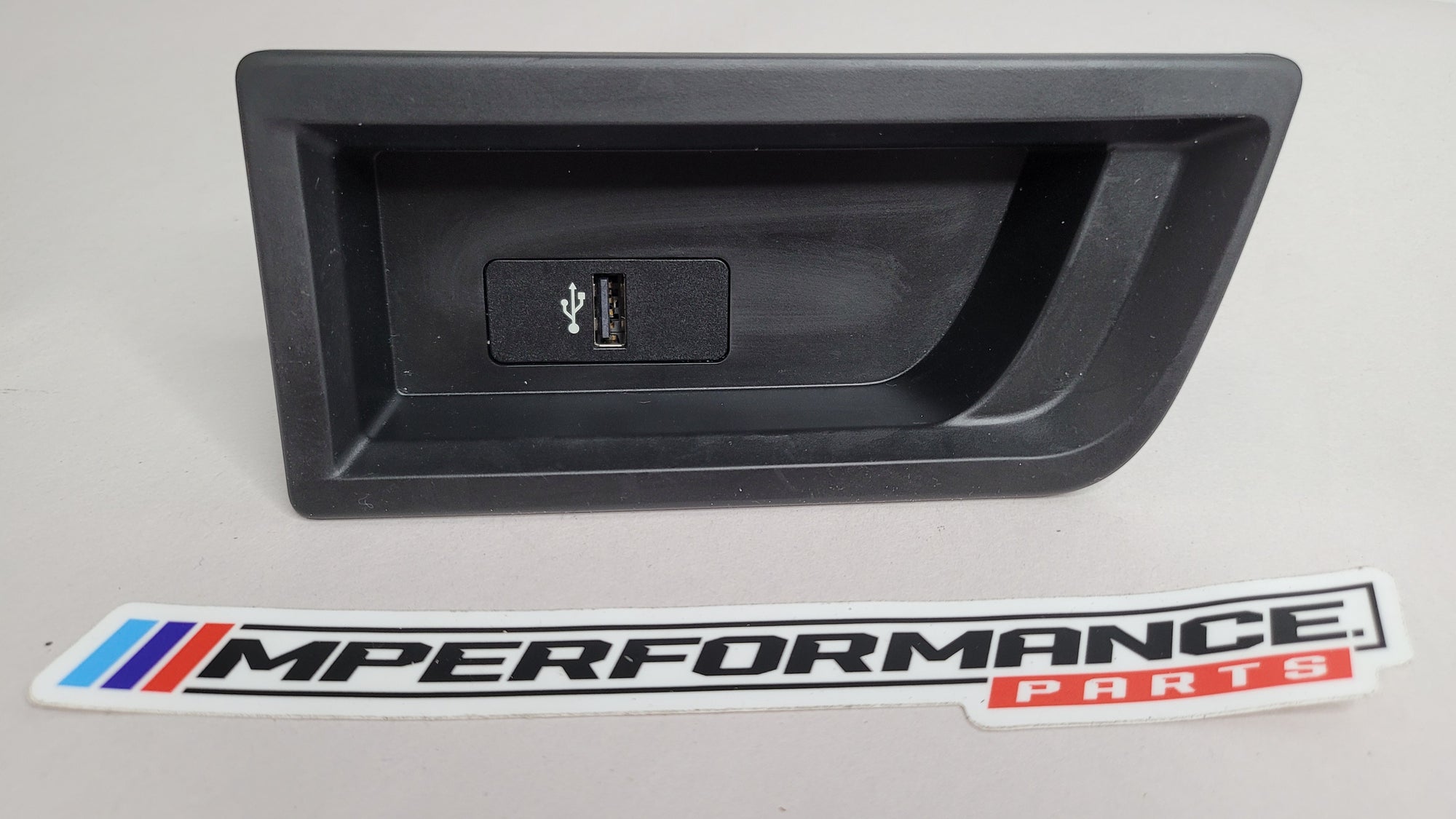 BMW 3 4 Series F30 F31 F34 F32 F33 F36 MPerformance.parts center console USB port installed in vehicle.