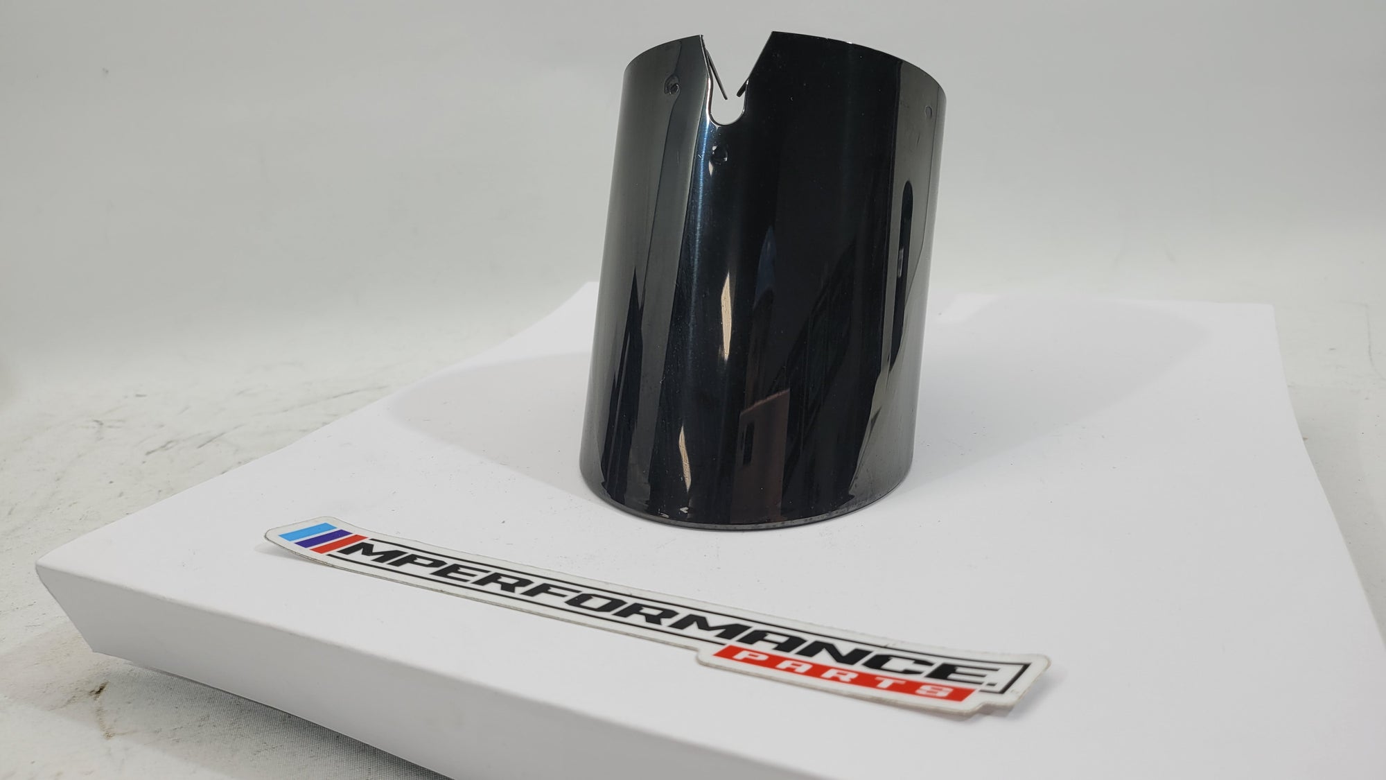 BMW G87 G80 G81 G82 G83 G90 G99 exhaust muffler tailpipe in black chrome by MPerformance.parts, showing the sleek, polished finish.