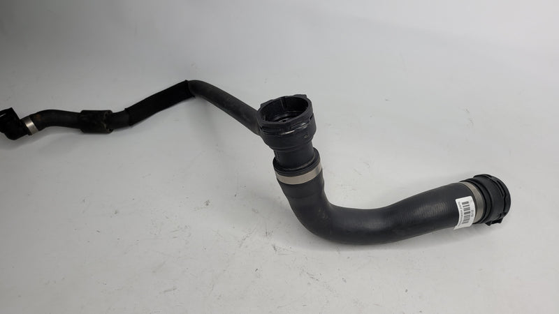 BMW M2 Competition F87 radiator cooling pipe hose line by MPerformance.parts, showing the black rubber hose in close-up detail.