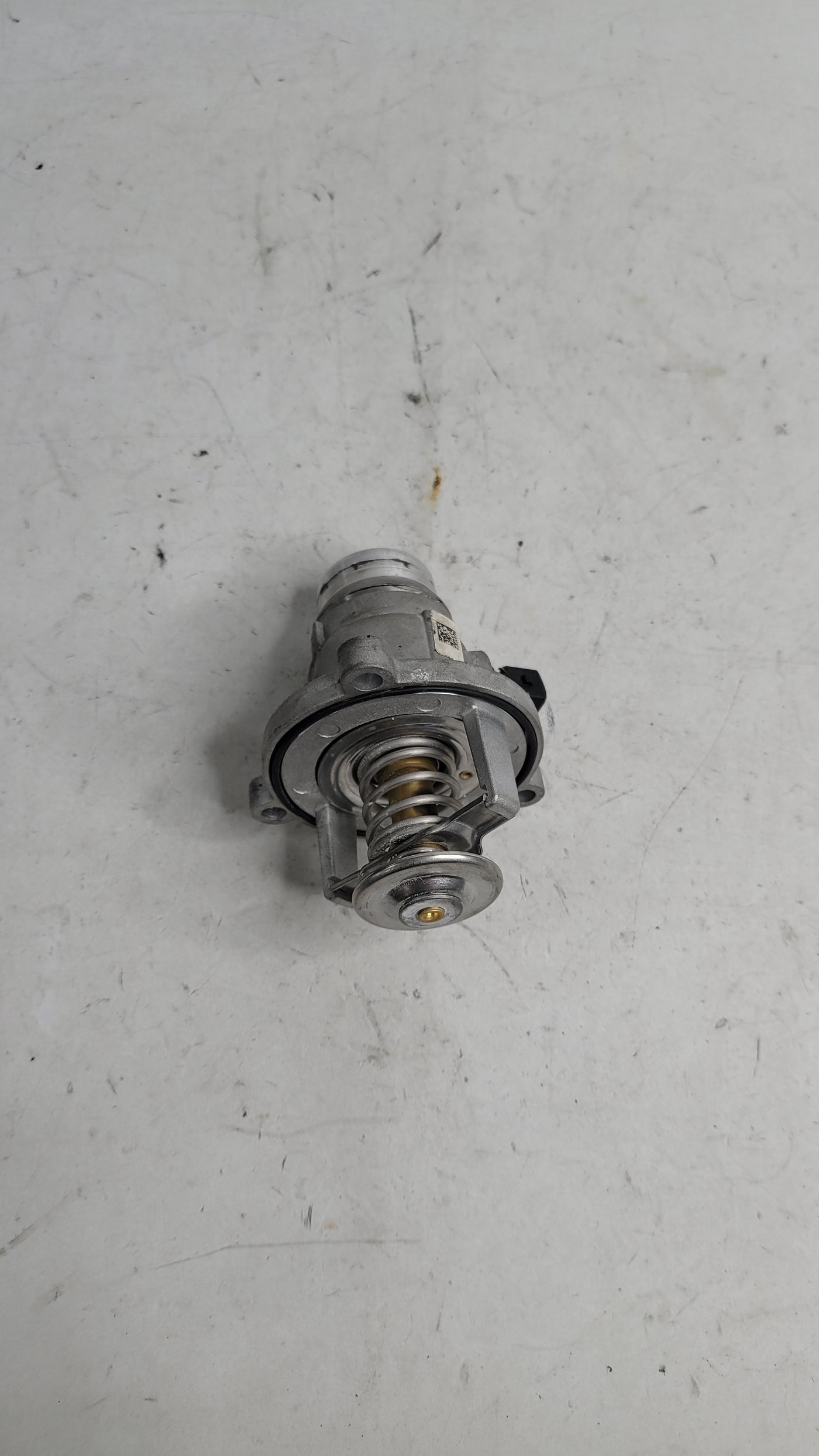 BMW X6 M, M5 F90, M3 F80, M4 F82 thermostat water pump from MPerformance.parts, showing the engine cooling component.