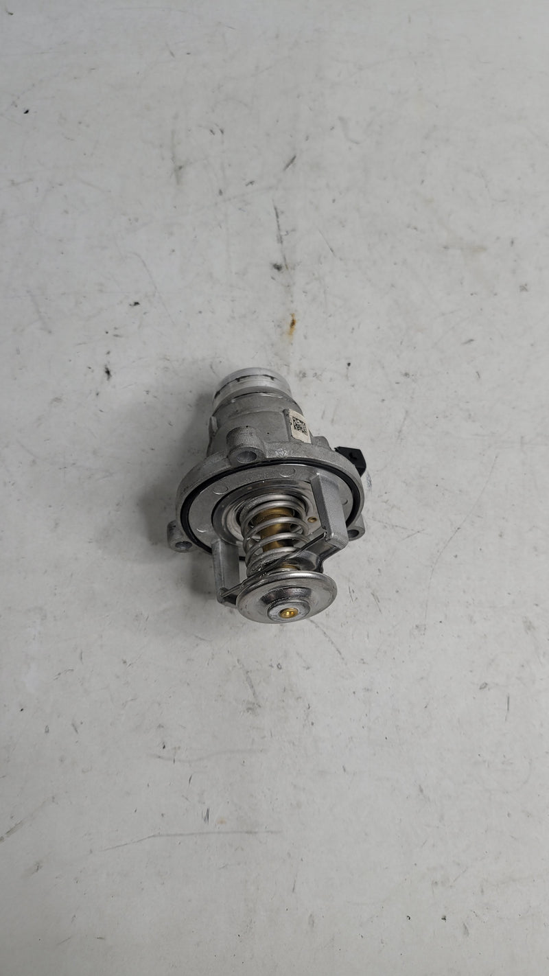 BMW X6 M, M5 F90, M3 F80, M4 F82 thermostat water pump from MPerformance.parts, showing the engine cooling component.