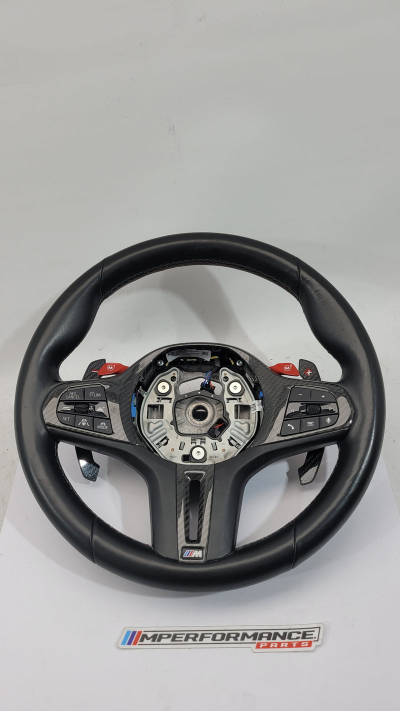 BMW M2 M3 M4 G80 G82 leather M Performance steering wheel with black leather and M logo, sporty design for high-performance driving.