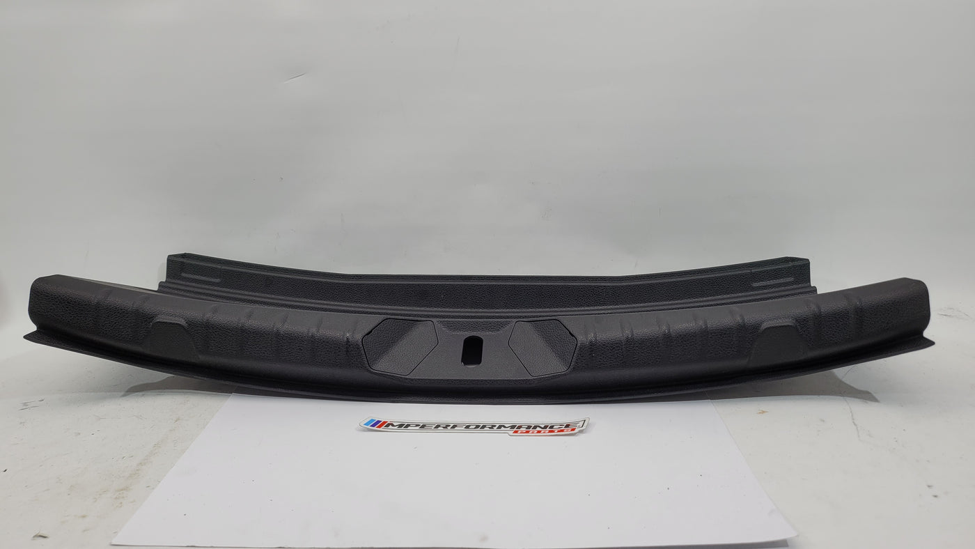 BMW 2 Series Coupe F22 F87 trunk boot lock trim in black with MPerformance.parts branding, designed for a sleek, custom look.