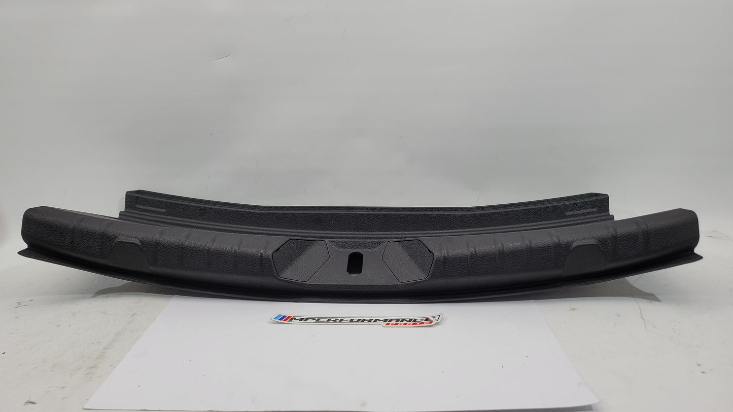 BMW 2 Series Coupe F22 F87 trunk boot lock trim in black with MPerformance.parts branding, designed for a sleek, custom look.