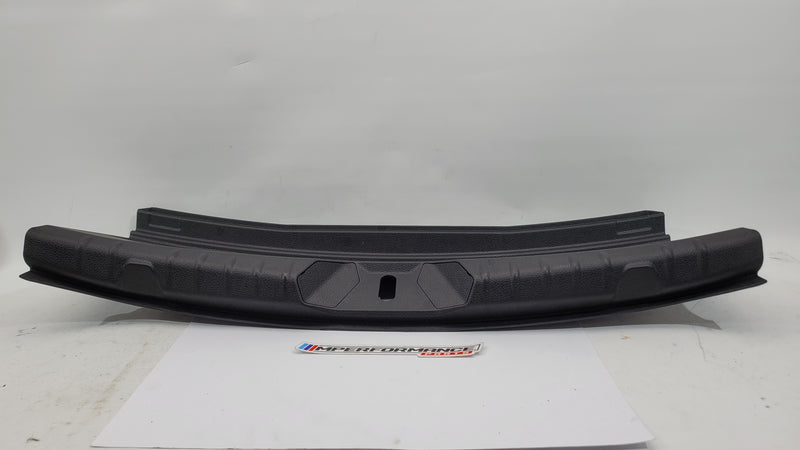 BMW 2 Series Coupe F22 F87 trunk boot lock trim in black with MPerformance.parts branding, designed for a sleek, custom look.