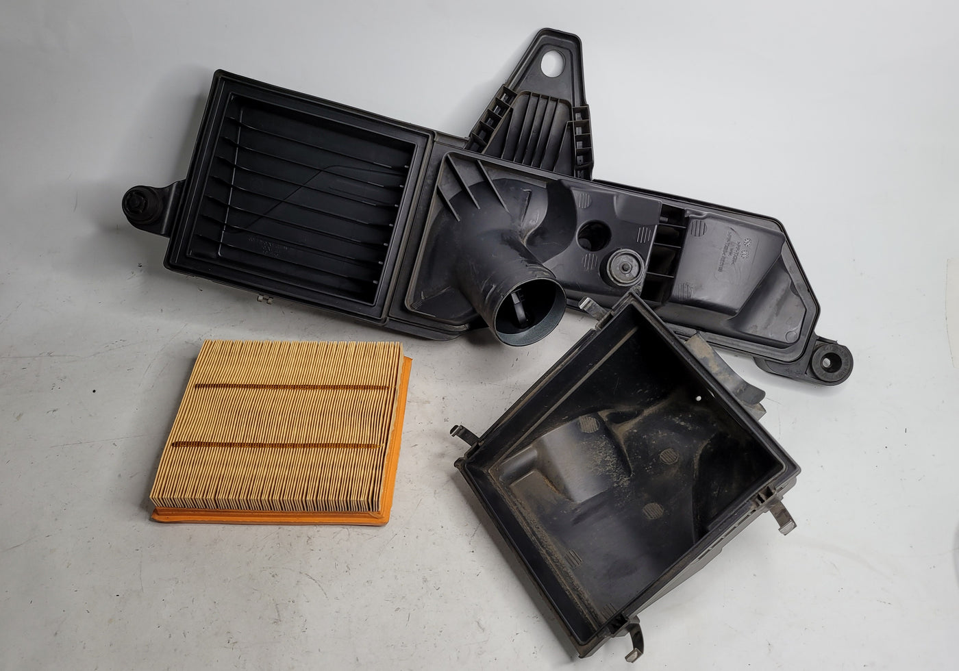 BMW 3 Series F30 N20 328i air filter housing box by MPerformance.parts, showing the black plastic filter compartment.