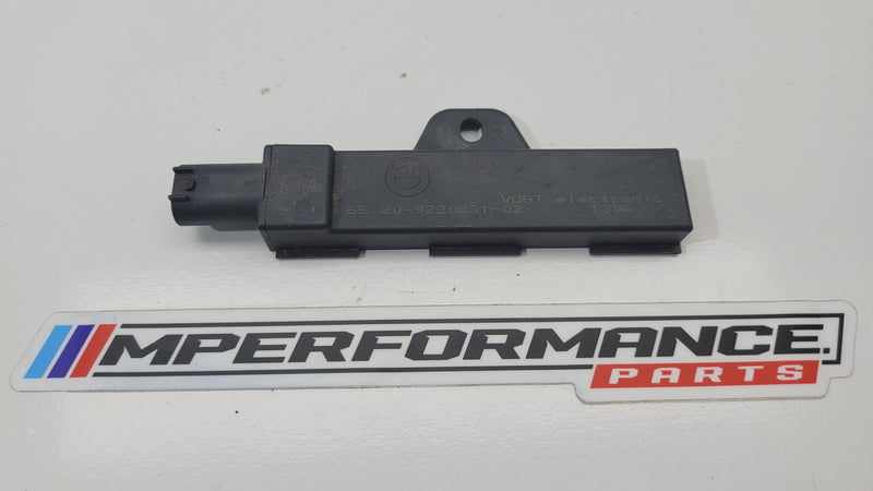 BMW M4 F82 exterior keyless access antenna module, black component with connectors, designed for keyless entry system.