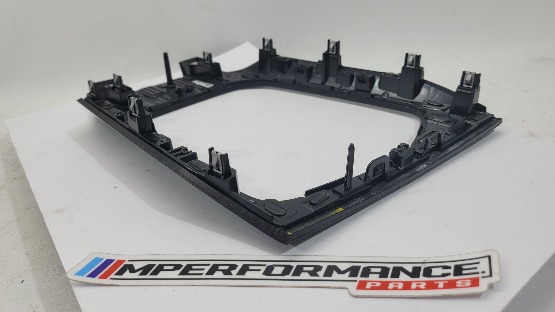 BMW M3 G80 interior carbon trim by MPerformance.parts, showcasing sleek black carbon fiber panels inside the vehicle.