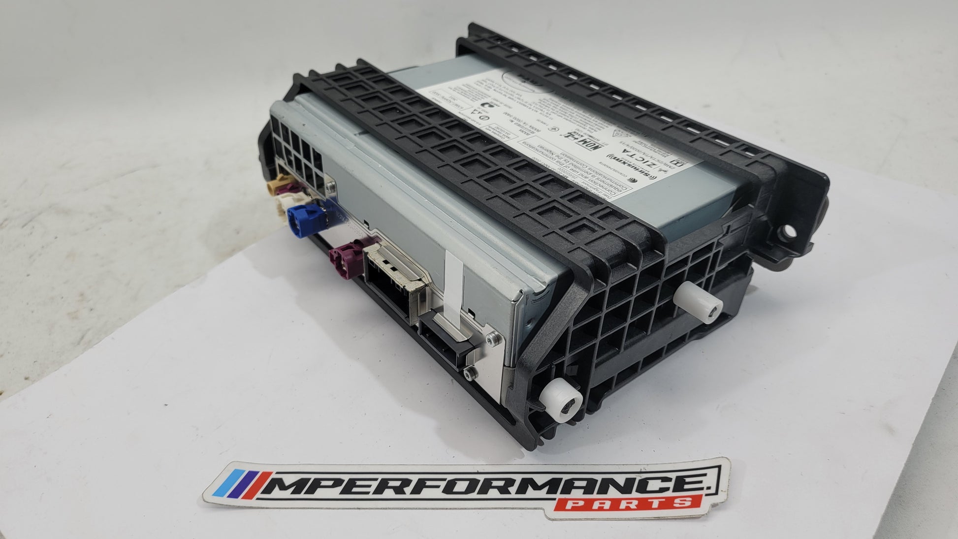 BMW G01 G20 G30 G05 G16 G26 G32 navigation and radio head unit with AM/FM display, branded by MPerformance.parts.